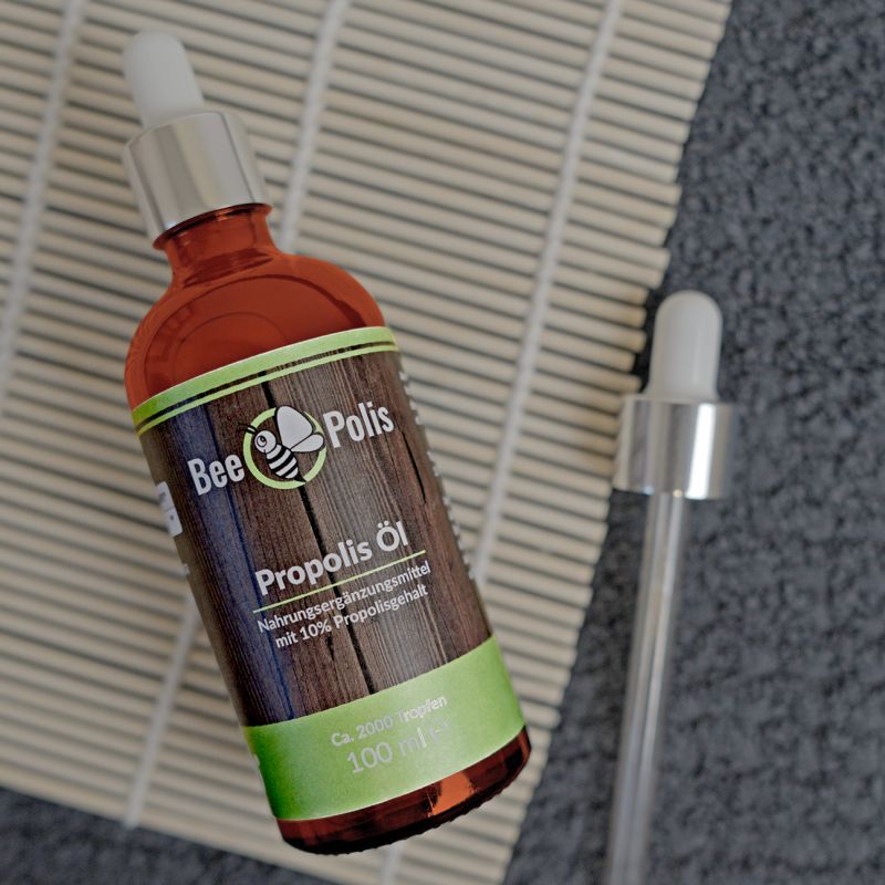 Preview: BeePolis Propolis Öl 100ml mit Pipette liegend